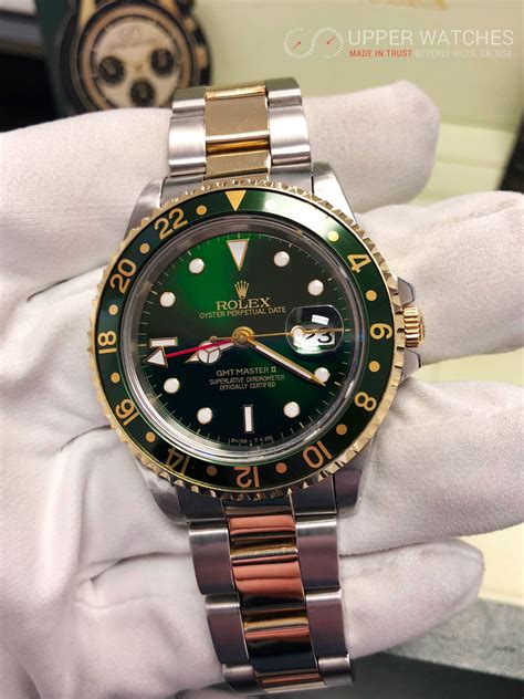 rolex gmt gold green dial